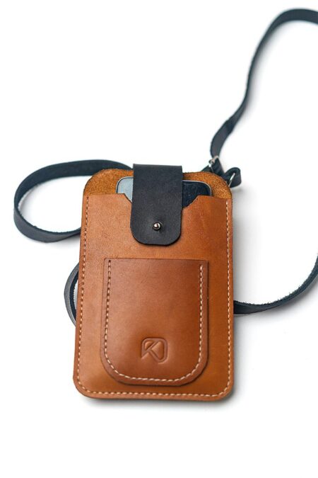 leather phone sling on with phone showing