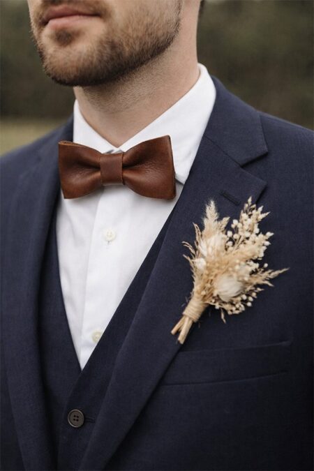 Men's premium leather bow tie worn on wedding day