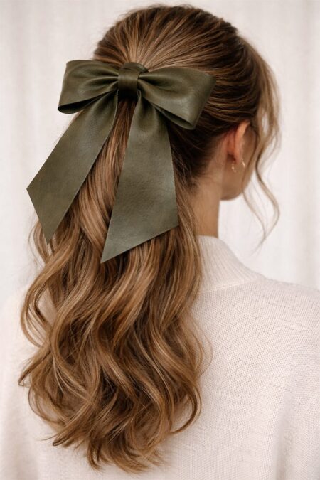 Hair bow on woman in olive green colour